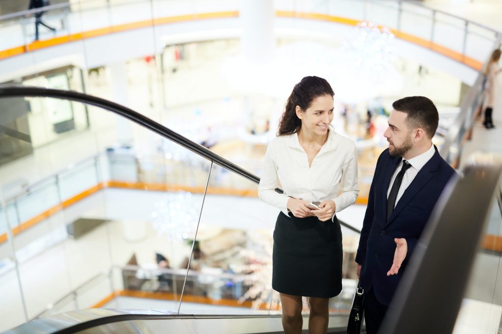 Traders on escalator